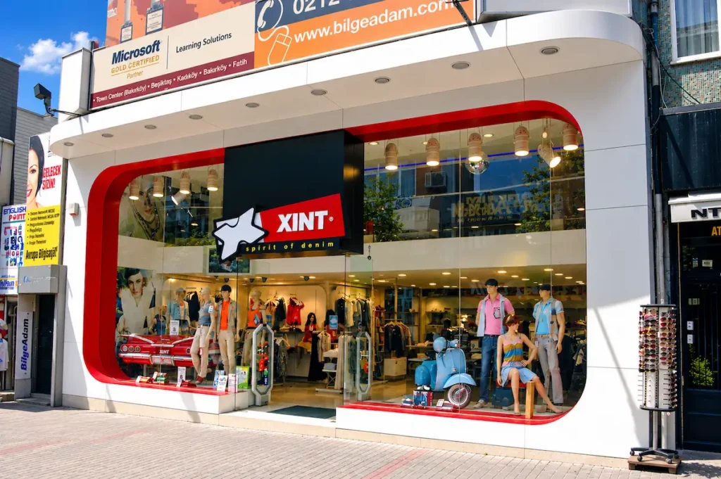 Melek Tekstil I Xint Mağazaları 106 Pruva Yapı Pruva Yapı Melek Tekstil Xint mapğazaları dış cephe tasarımı kompakt laminat uygulaması