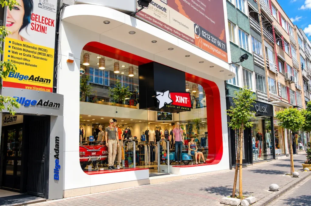 Melek Tekstil Xint mapğazaları dış cephe tasarımı kompakt laminat uygulaması